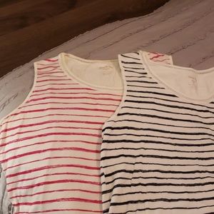 2 white stag sleeveless tops